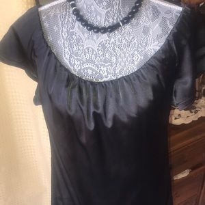 Bebe black evening dress.Satin lined elast neck